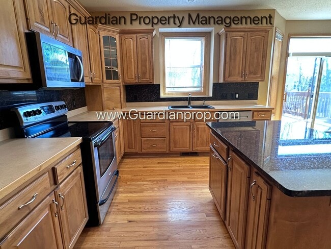 Photo - Brooklyn Park Single Family Home, Office, 3 Car Garage, New Carpet, Large Deck, Available Now