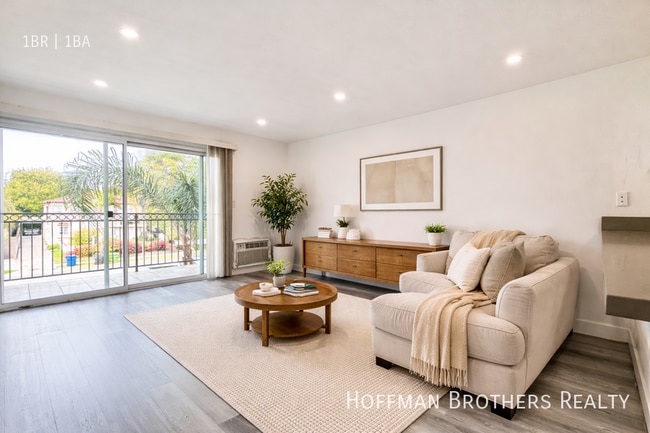 Building Photo - 5700 W Olympic Blvd Unit 1
