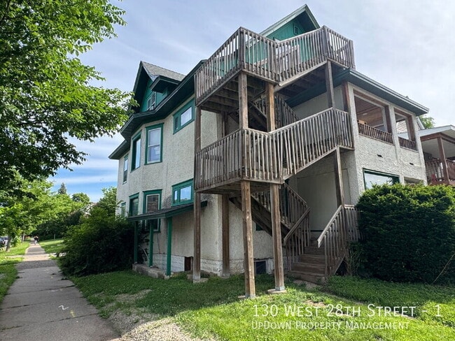 Building Photo - 130 W 28th St Unit 1