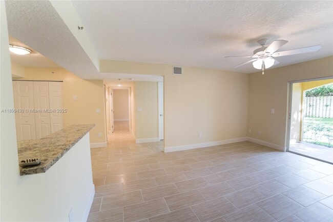 Building Photo - 5590 NW 61st St Unit 817