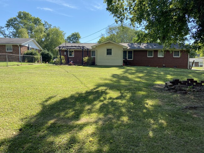 View of backyard from the fence - 412 E Lakeside Dr