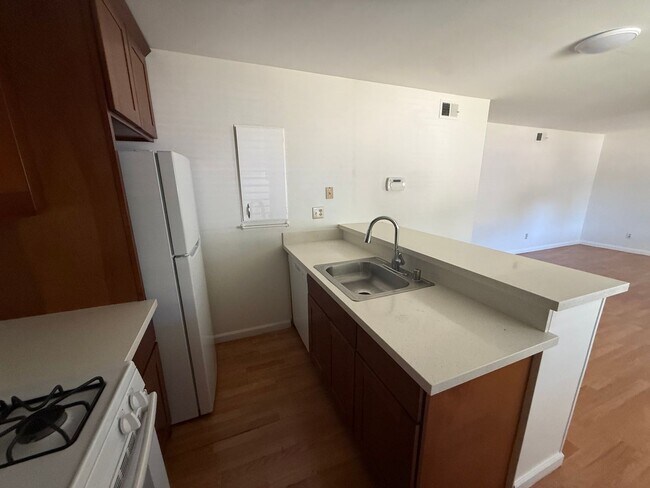 Photo - 2 bed | 1 bath | 795 SF | Shared garage | Downstairs unit | WS&G Paid by Owner