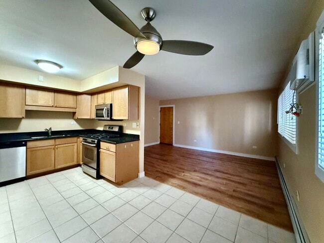 Photo - Pristine 2 Bedroom, 1 Bathroom Condo Available NOW! Heat, Water, & Parking INCLUDED in Rent! Unidad 1A