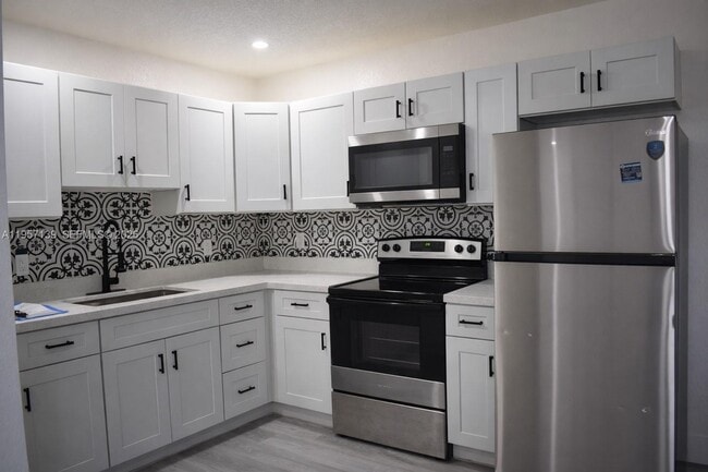 Photo - 900 NW 8th Ave Unidad 1