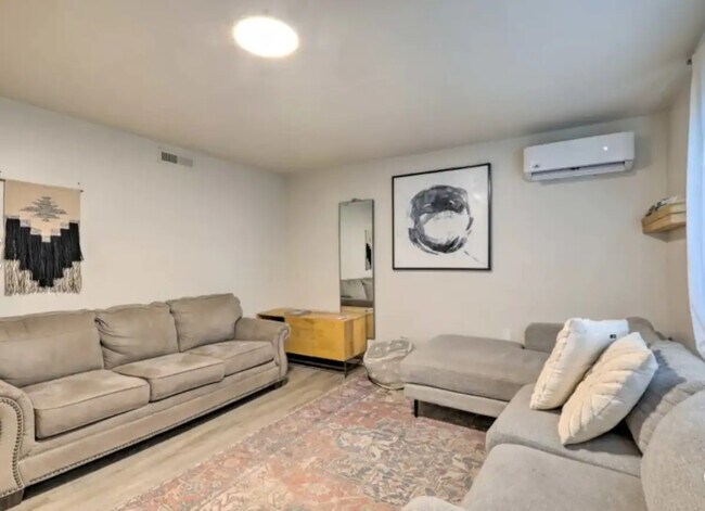 Living room - 3440 S Walkup Dr Unit Apartment in the Pines