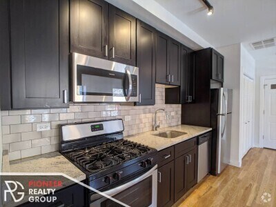 Building Photo - 4628 N Leavitt St Unit 3 Rental