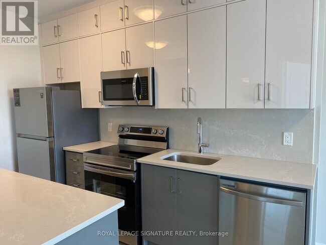 Photo - 95 Dundas St W Unité 112