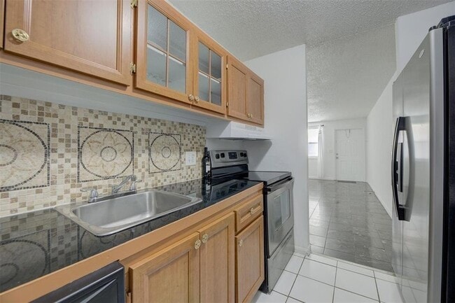 Photo - 850 E Commercial Blvd Unit 225