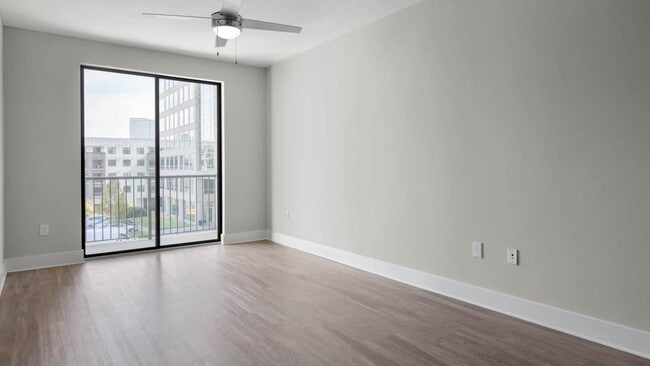 Living Room with Balcony and Hard Surface Flooring