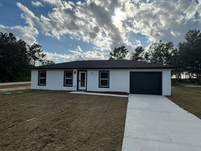 Building Photo - Brand New Designer Home Ready for Family