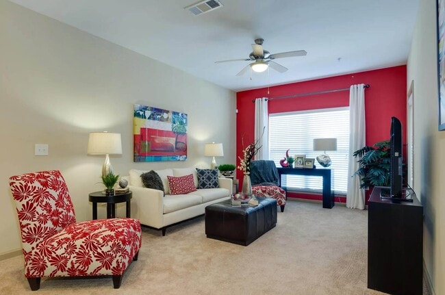 Spacious living room with large picturesque windows perfect for ample natural lighting
