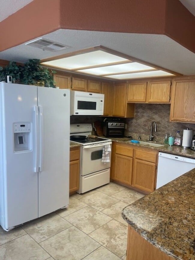 Photo - Ground level 2-bedroom 2-bathroom unit loc...