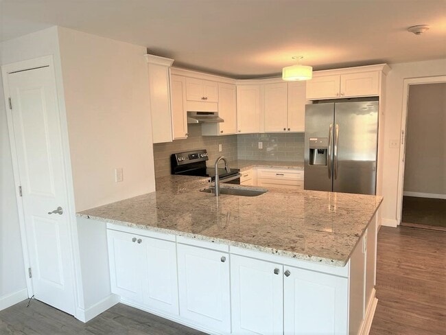 Building Photo - 1321 Worcester Rd Unit 607