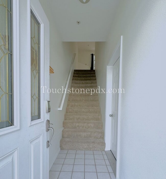 Photo - Light Filled 3 Bedroom Townhome with Deck, Attached Garage, and AC