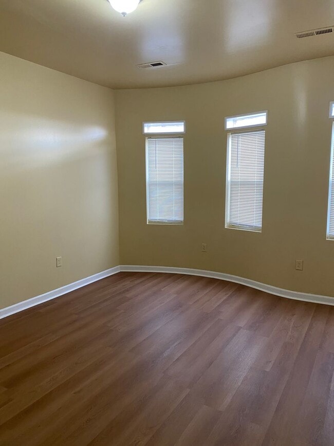 Photo - Spacious Rooms! Hardwood Flooring Throughout! A/C! W/D Hook-Up!