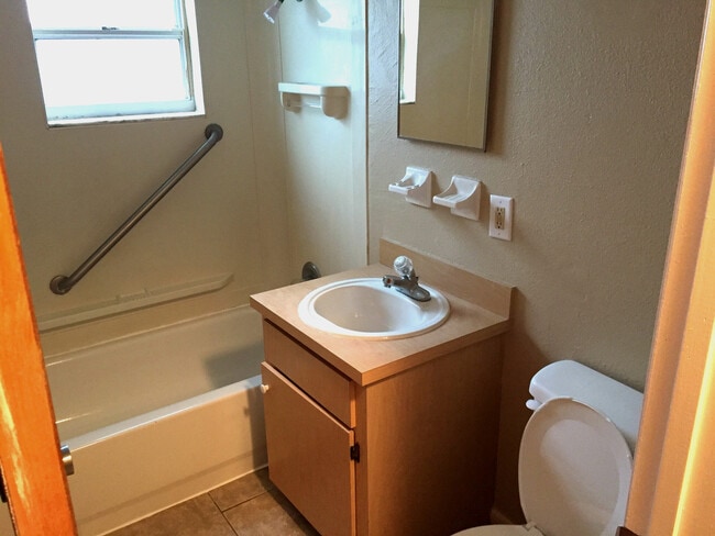 Photo - Charming Three-Bedroom, One-Bathroom Singl...