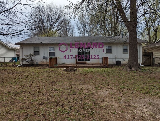 Photo - Charming 3-Bedroom Home with Fenced Yard & 2-Car Garage in Springfield