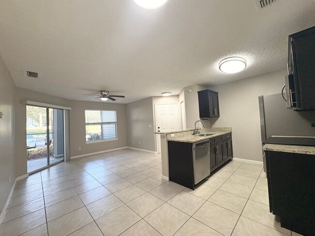Photo - Lake Mary Condo ~ Fresh Paint, Tile Flooring, Updated Kitchen/Bath! Unit 109