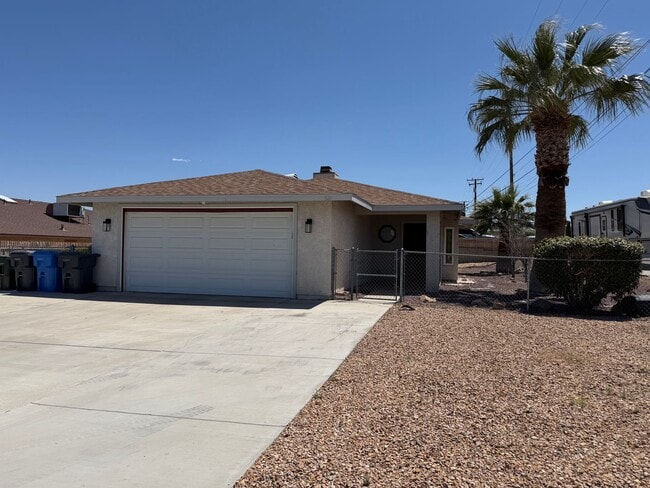 Building Photo - Beautiful 3 Bedroom 2 Bathroom House With 2 Car Garage and Fenced Yard