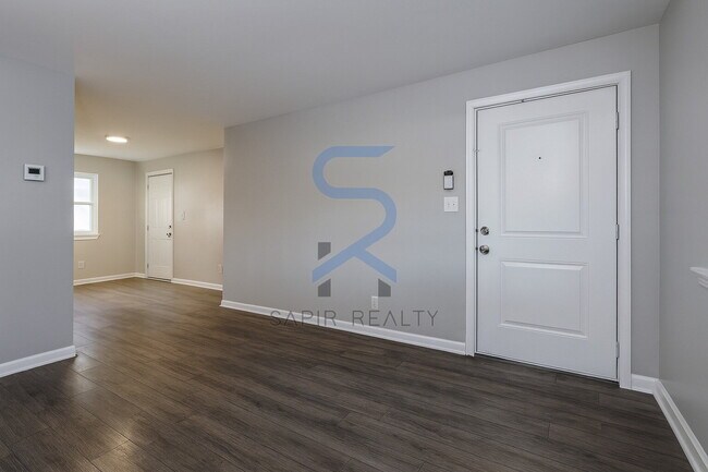 Photo - Move in before November 30th and choose your reward: a $250 Amazon Gift Card or a 55" Smart TV! Unit 2