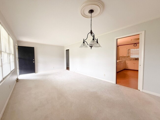 Photo - 3-Bedroom Home with Spacious Yard, Storage Shed & Natural Light