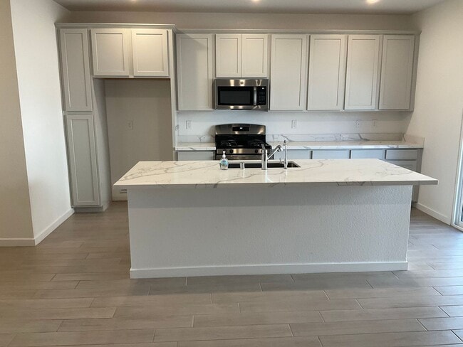 Building Photo - Stunning 4-Bedroom Home with Private Next Gen Suite & Entertainer's Loft