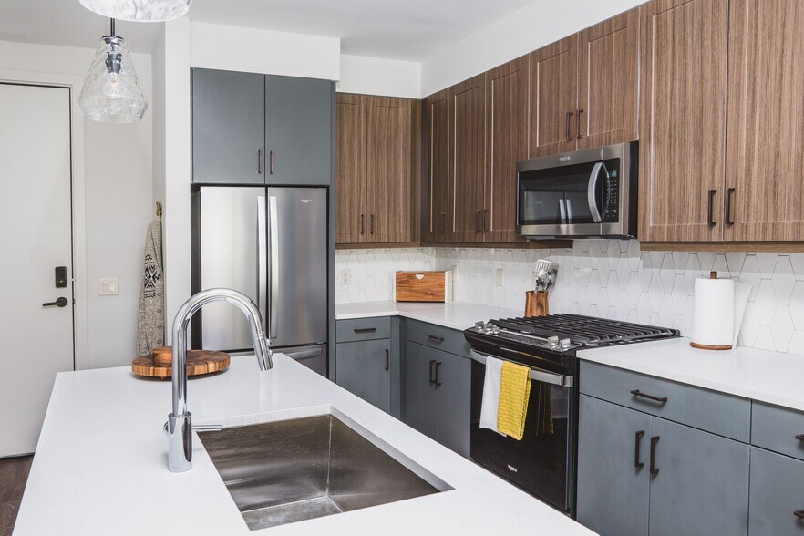 Choice of cabinetry colors schemes: shaker-style wood with grey or flat-front white