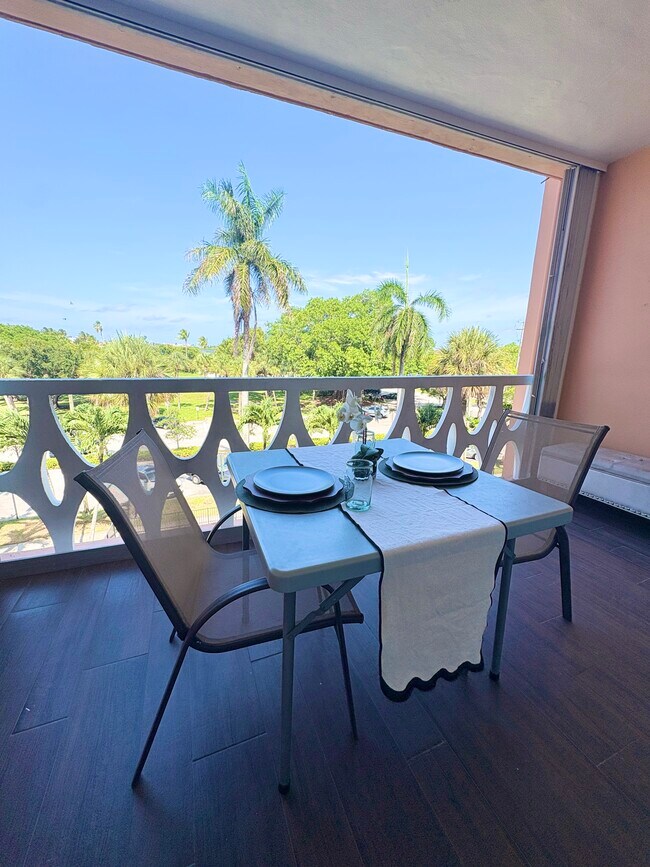 Dining on the large balcony with a separate exterior storage room