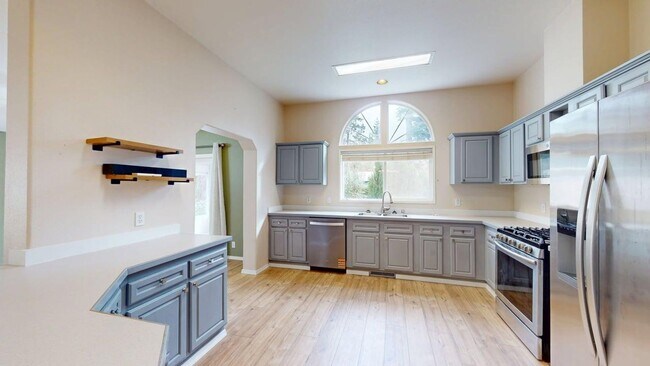 Photo - Wake up just steps from Penn Cove with space to spread out, store your boat, and fully enjoy Whid...