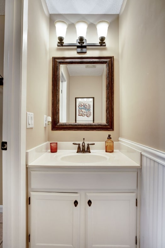 Downstairs half bath. - 9259 Troon Court