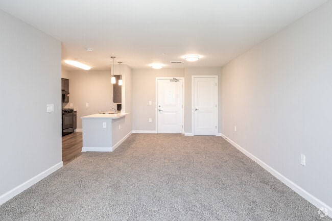3BR, 3BA - 1193 SF - Living Room - Woodland Gardens I