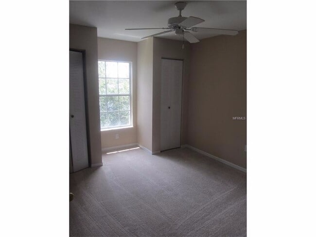 Photo - Water view condo with garage in sought after westchase