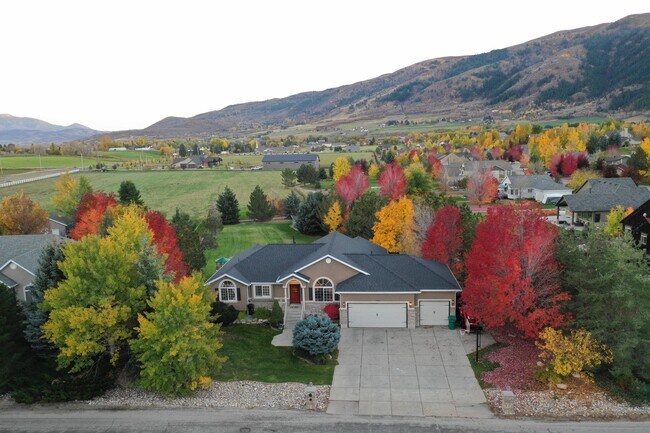 Photo - Beautiful home with 3 car garage and oversized covered deck.