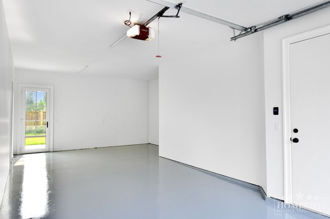 Spacious Executive 3-Bedroom Suite with Private Yard & Utilities Included