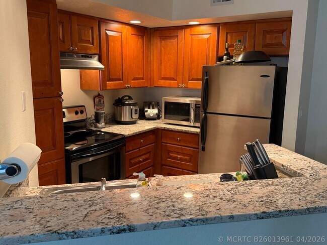 Building Photo - 1401 Village Blvd Unit 416