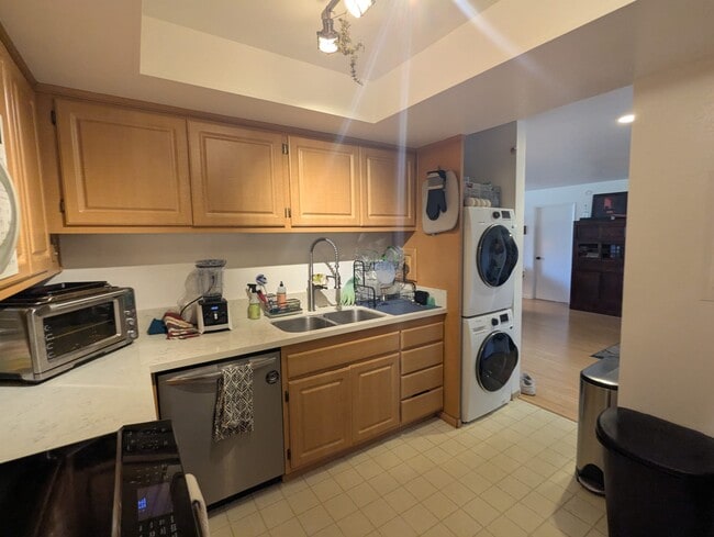 Kitchen with view of W/D - 3340 McCaw Ave Unit McCaw Condo with Private Bedroom and Bathroom