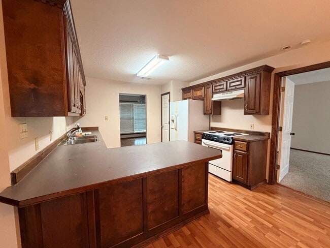 Photo - Discover this spacious 3-bedroom, 2-bathroom home in Russellville, AR.