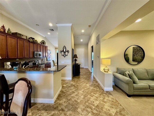 Building Photo - 11021 Corsia Trieste Way Unit 203