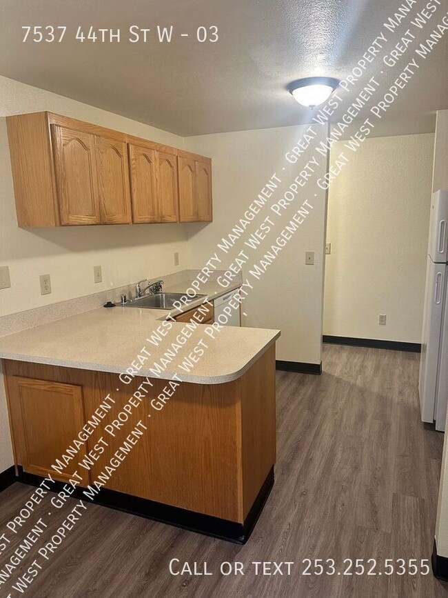 Building Photo - 7537 44th St W Unit 03 Rental