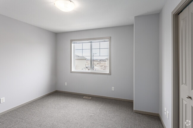 2 chambres, 3 salles de bain - 1132 pi² (+566 pi² au sous-sol) - - Belmont Village Townhomes