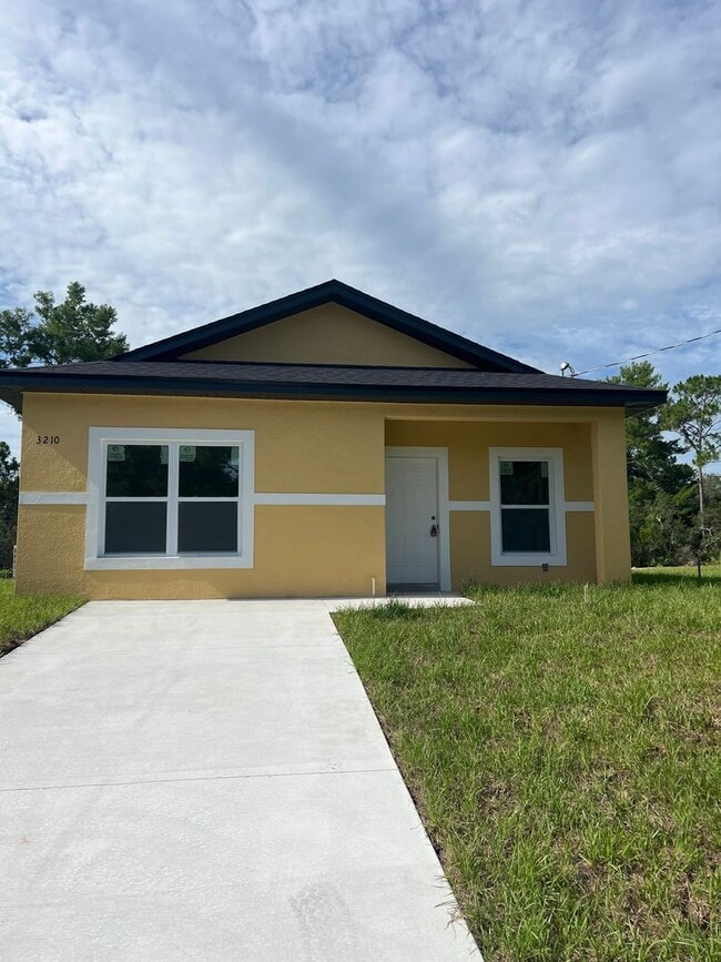 Building Photo - COZY COTTAGE 2/2 IN LAKE PLACID FL Rental
