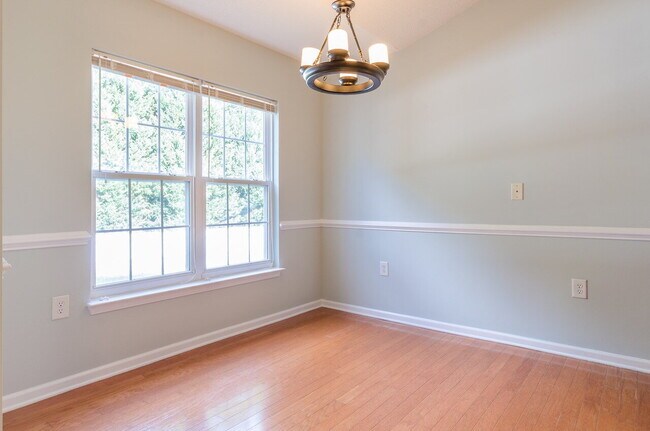 Photo - "Charming 3-Bed Oasis with Spacious 1800 sqft and Private Fenced Backyard in Huntersville!"