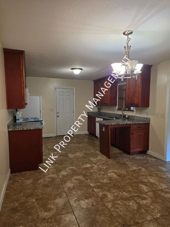 Photo - COMING SOON July 24th! Don't miss this 3 Bedroom 1.5 Baths with Garage, Fenced Backyard, Den and...