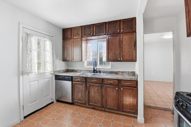 Photo - $2,030.95 - 3 Bedrooms, 1 Bathroom, Single Family Home in Aurora with fenced Yard!