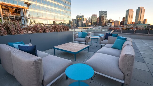 Ample social seating with views of Seattle