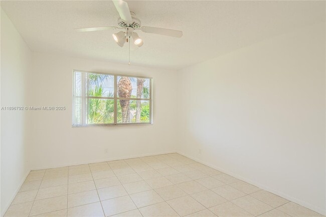 Photo - 9033 Wiles Rd Unit 303