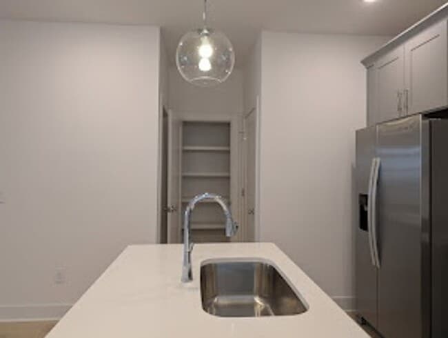 Photo - New construction three-story townhome offe...