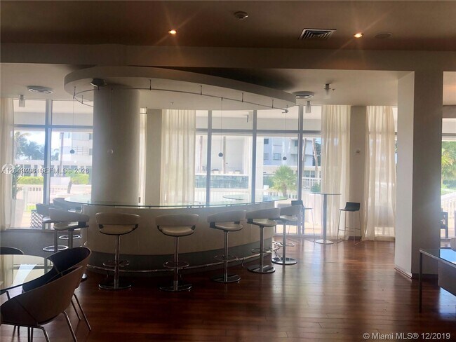 10275 Collins Ave Unit 230