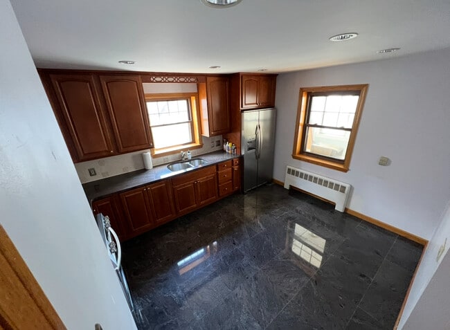 Eat In Kitchen with Modern Appliances and granite countertops. - 202 Orient Ave Unit 2