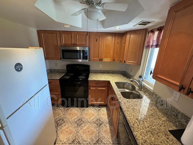 Building Photo - 19505 Quesada Ave Unit #DD202